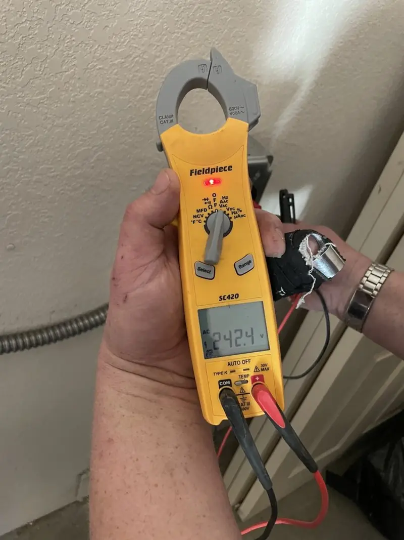 Voltage testing with clamp meter during Aluminum Wiring Replacement in Hamilton